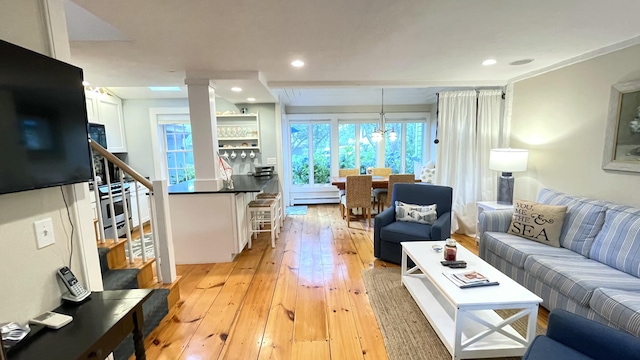 40 Brant Rock Rd, Mashpee, MA 02649 - living area with light wood finished floors, decorative columns, and recessed lighting