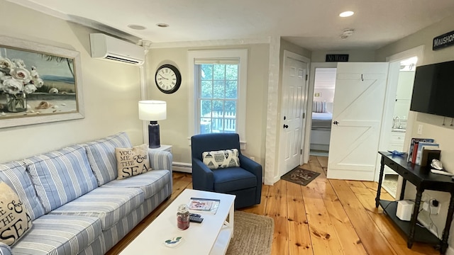 40 Brant Rock Rd, Mashpee, MA 02649 - living room featuring a wall mounted AC, light wood-style floors, a baseboard heating unit, and recessed lighting