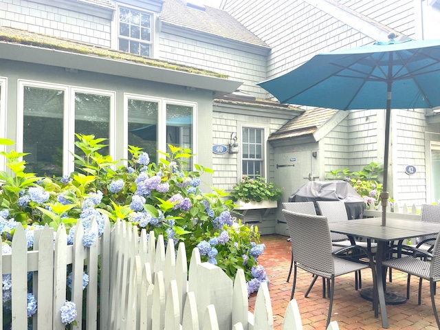 40 Brant Rock Rd, Mashpee, MA 02649 - wooden deck featuring a patio, outdoor dining space, and grilling area