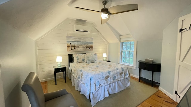 40 Brant Rock Rd, Mashpee, MA 02649 - bedroom featuring a wall mounted air conditioner, lofted ceiling, ceiling fan, and wood finished floors