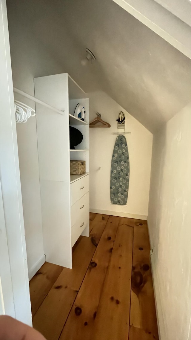 40 Brant Rock Rd, Mashpee, MA 02649 - walk in closet featuring vaulted ceiling and wood finished floors