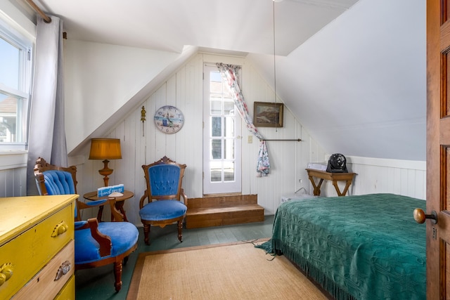 bedroom with lofted ceiling