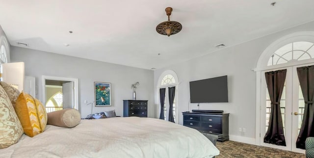 143 Main St, Sandwich, MA 02563 - carpeted bedroom featuring baseboards, visible vents, and multiple windows