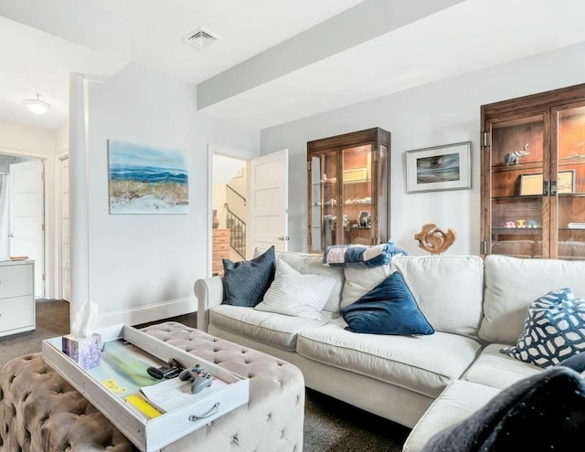 143 Main St, Sandwich, MA 02563 - living area featuring stairway, carpet floors, visible vents, and baseboards