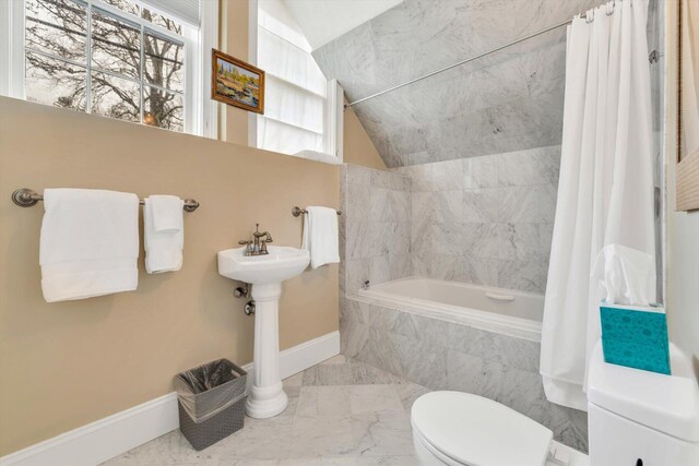 143 Main St, Sandwich, MA 02563 - full bathroom with toilet, marble finish floor, tiled shower / bath combo, baseboards, and lofted ceiling