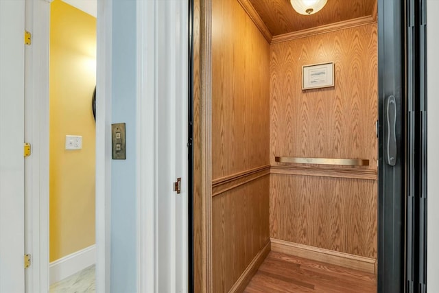 143 Main St, Sandwich, MA 02563 - interior details featuring elevator, wood walls, and baseboards