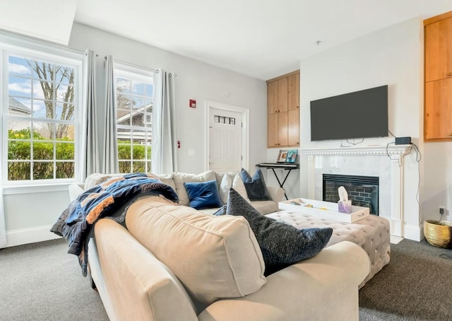 143 Main St, Sandwich, MA 02563 - carpeted living room featuring baseboards and a glass covered fireplace