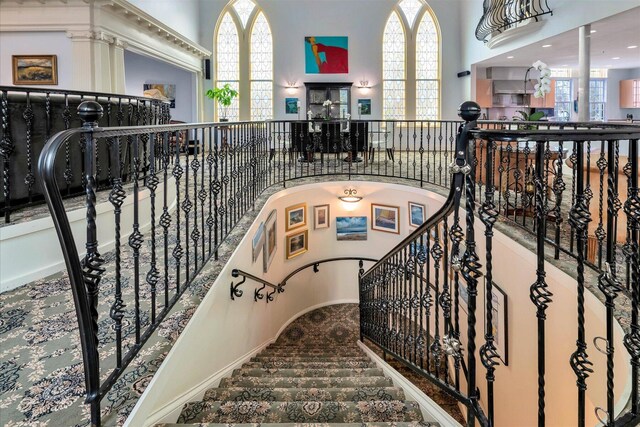 143 Main St, Sandwich, MA 02563 - stairway featuring a wealth of natural light and carpet floors
