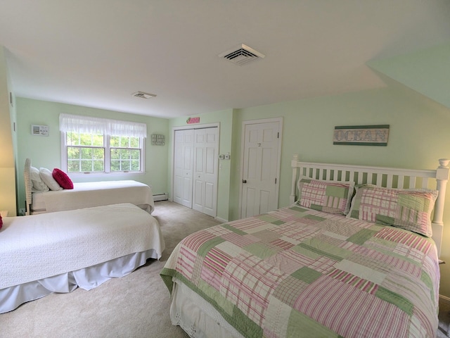 32 Apple Ln, Dennis, MA 02638 - carpeted bedroom featuring a closet and a baseboard radiator