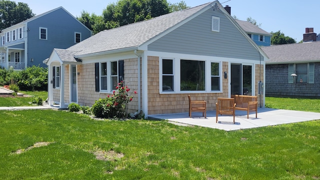 2-A Bodfish Ave, Sandwich, MA 02563 - back of house with a patio, roof with shingles, and a yard