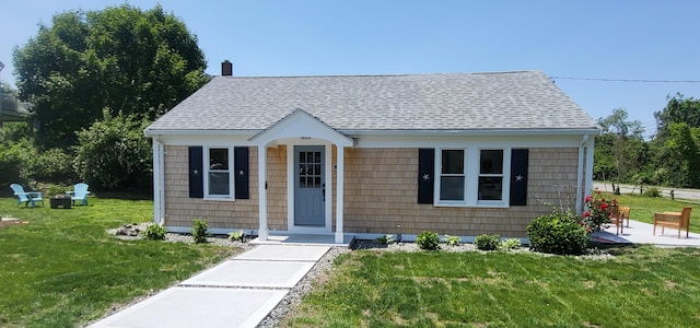 2-A Bodfish Ave, Sandwich, MA 02563 - bungalow featuring a shingled roof and a front lawn