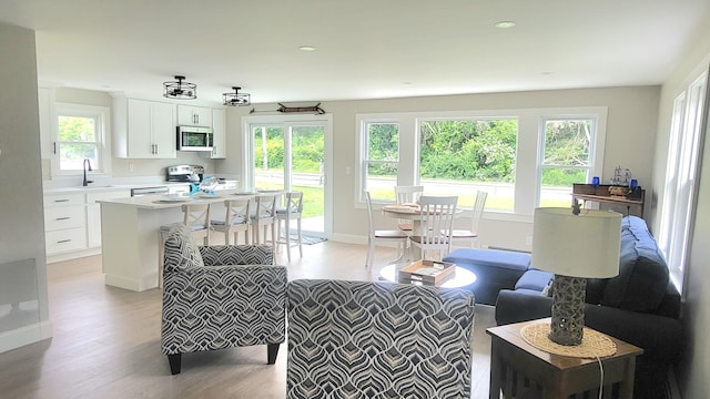 2-A Bodfish Ave, Sandwich, MA 02563 - living area with light wood finished floors and baseboards