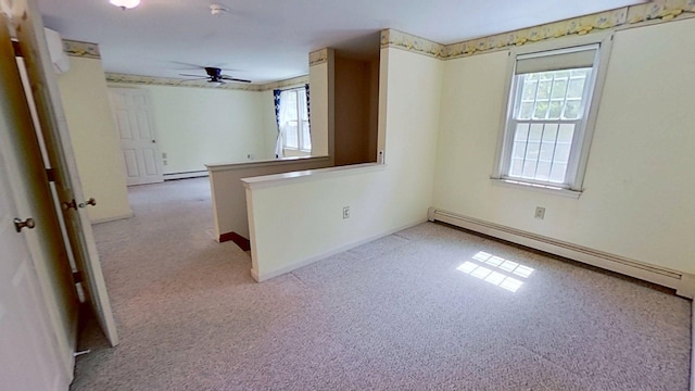91 Hitching Post Ln, Centerville, MA 02632 - carpeted empty room featuring a baseboard radiator, a ceiling fan, and baseboards