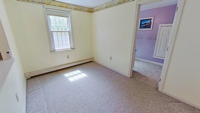 91 Hitching Post Ln, Centerville, MA 02632 - carpeted spare room with a baseboard radiator