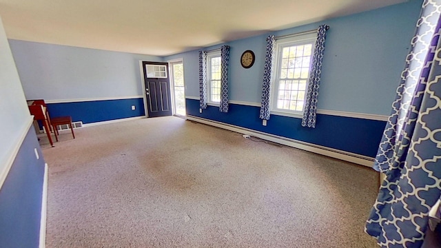 91 Hitching Post Ln, Centerville, MA 02632 - spare room featuring baseboards and a baseboard radiator