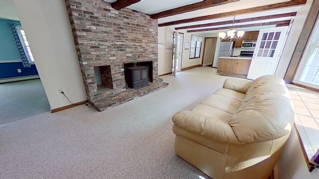 91 Hitching Post Ln, Centerville, MA 02632 - living area featuring a chandelier, a baseboard heating unit, healthy amount of natural light, baseboards, and beamed ceiling