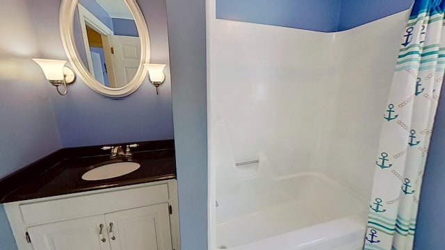 91 Hitching Post Ln, Centerville, MA 02632 - bathroom featuring vanity and shower / tub combo