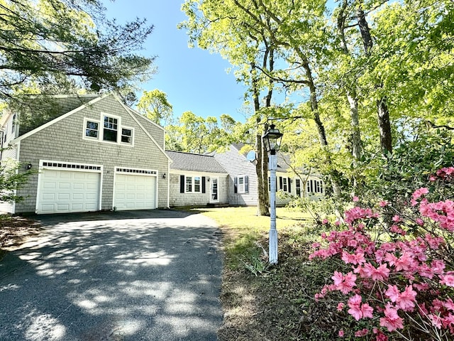 91 Hitching Post Ln, Centerville, MA 02632 - view of front of property featuring driveway and a garage