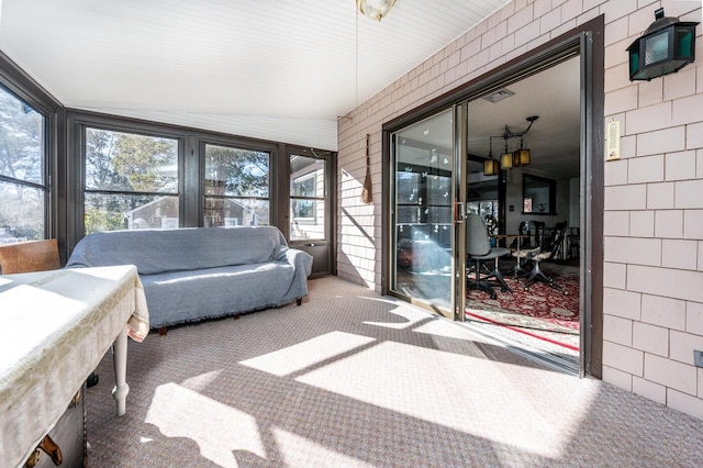 sunroom / solarium featuring a wealth of natural light