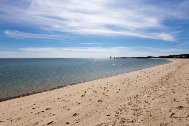 property view of water featuring a beach view