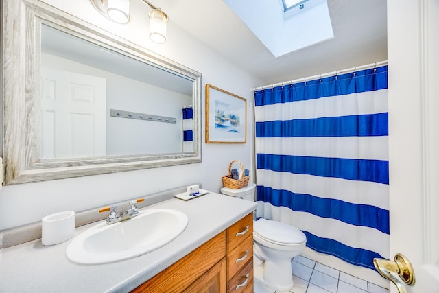 full bath featuring a skylight, toilet, tile patterned floors, curtained shower, and vanity