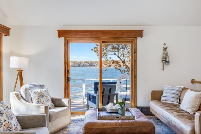 living room featuring a water view