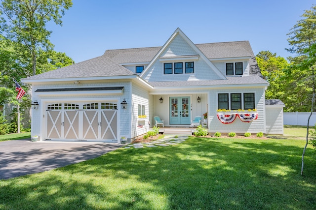 79 Neshobe Rd, Mashpee, MA 02649 - shingle-style home with french doors, asphalt driveway, roof with shingles, and an attached garage