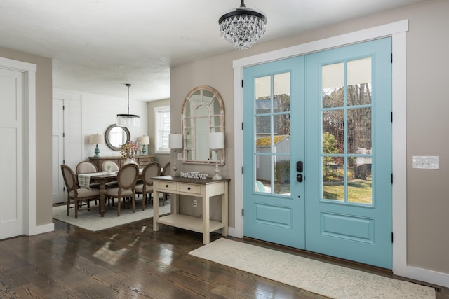 79 Neshobe Rd, Mashpee, MA 02649 - foyer featuring a chandelier and dark wood finished floors