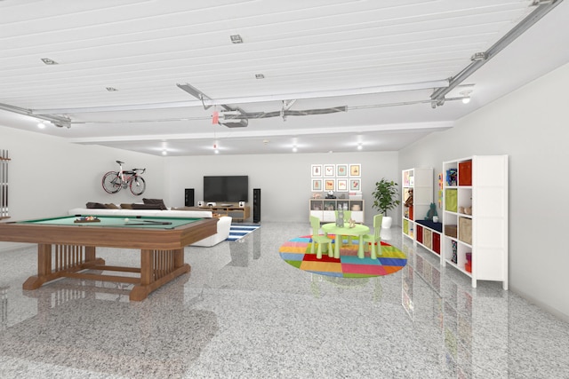 recreation room with a garage, speckled floor, and billiards