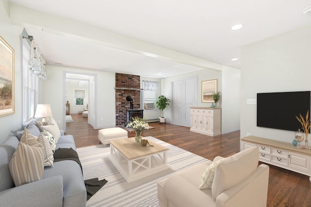 living room featuring a wood stove, recessed lighting, and dark wood-style flooring