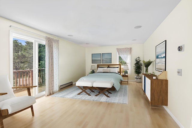 bedroom with a baseboard radiator, light wood-style floors, baseboards, and access to exterior