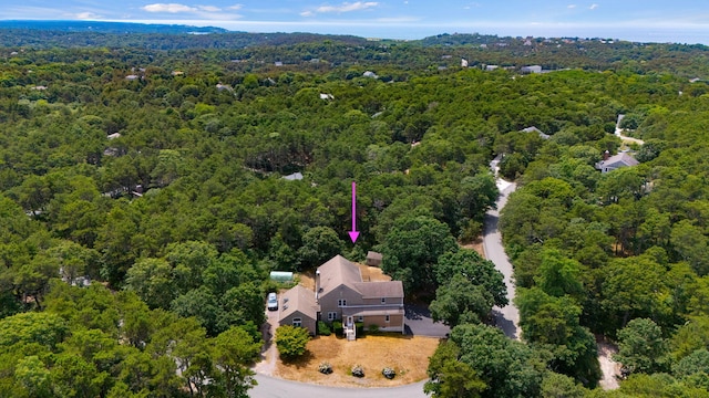 aerial view featuring a forest view
