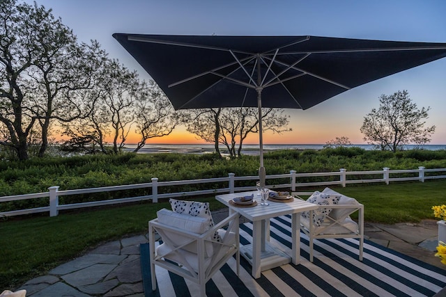 view of patio / terrace with a water view