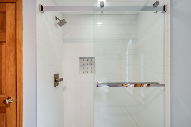 bathroom with an enclosed shower