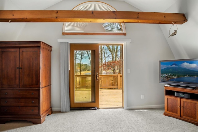 living room with light carpet, lofted ceiling with beams, and baseboards