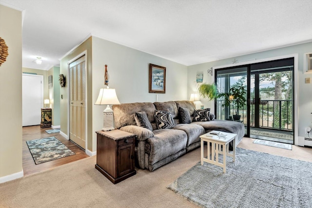 carpeted living room with crown molding