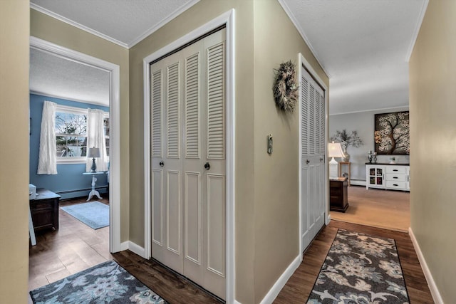 hall with crown molding, dark hardwood / wood-style floors, a textured ceiling, and a baseboard radiator