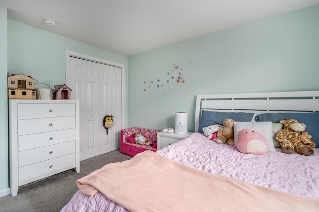 carpeted bedroom featuring a closet