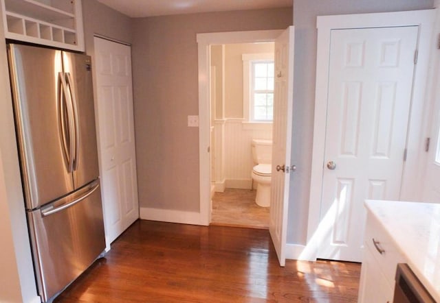 16 Regency Dr, Sagamore, MA 02561 - kitchen featuring freestanding refrigerator, dark wood-style floors, baseboards, light countertops, and white cabinets
