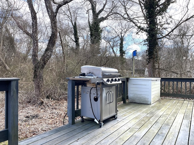 16 Regency Dr, Sagamore, MA 02561 - deck featuring grilling area and view of wooded area