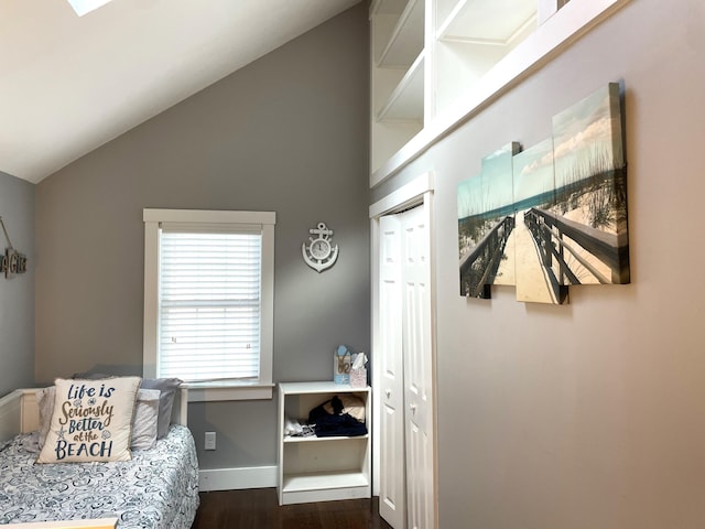 16 Regency Dr, Sagamore, MA 02561 - bedroom with lofted ceiling, dark wood-type flooring, and baseboards