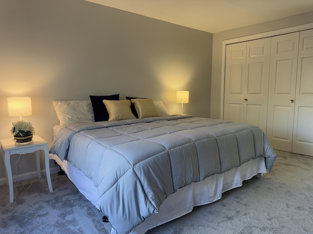 carpeted bedroom with a closet