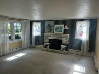 unfurnished living room featuring a fireplace and plenty of natural light