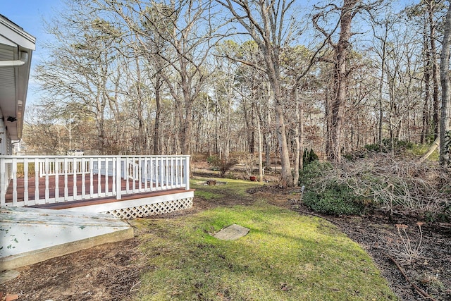 view of yard featuring a wooden deck