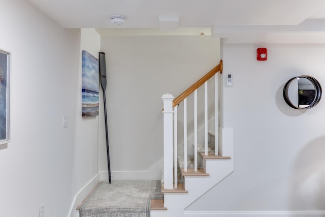 stairway with baseboards