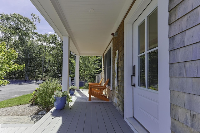 wooden deck featuring a porch