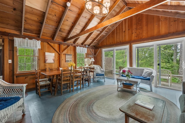 92 John Joseph Rd, Harwich, MA 02645 - living area with wood walls, plenty of natural light, wooden ceiling, and a chandelier
