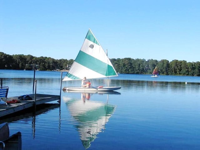92 John Joseph Rd, Harwich, MA 02645 - dock area featuring a view of trees and a water view