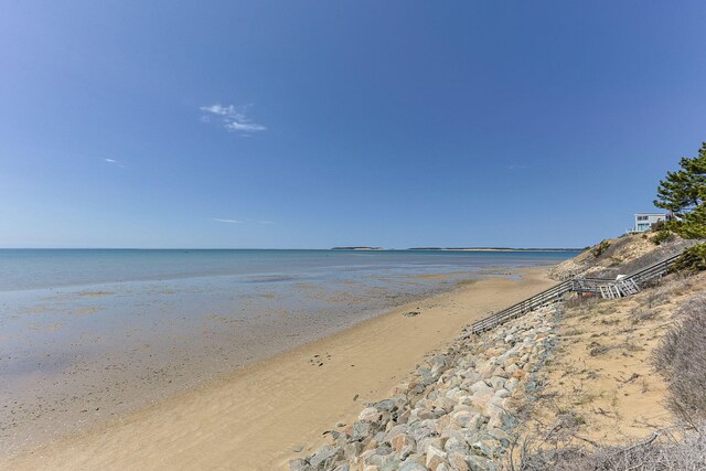 view of water feature with a beach view