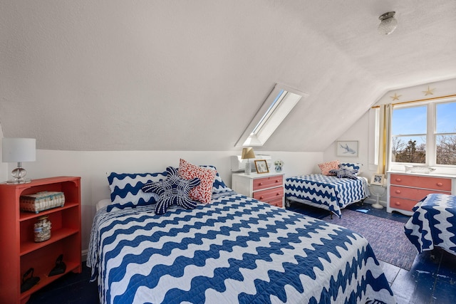 bedroom featuring lofted ceiling